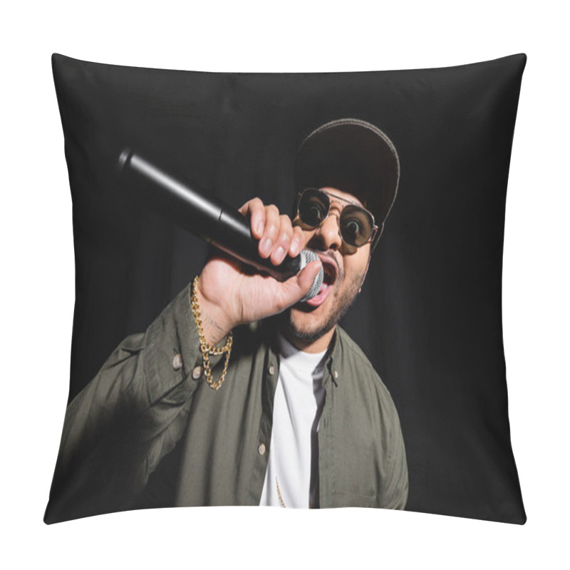 Personality  Emotional Middle East Hip Hop Singer In Sunglasses And Cap Singing In Microphone And Gesturing Isolated On Black Pillow Covers