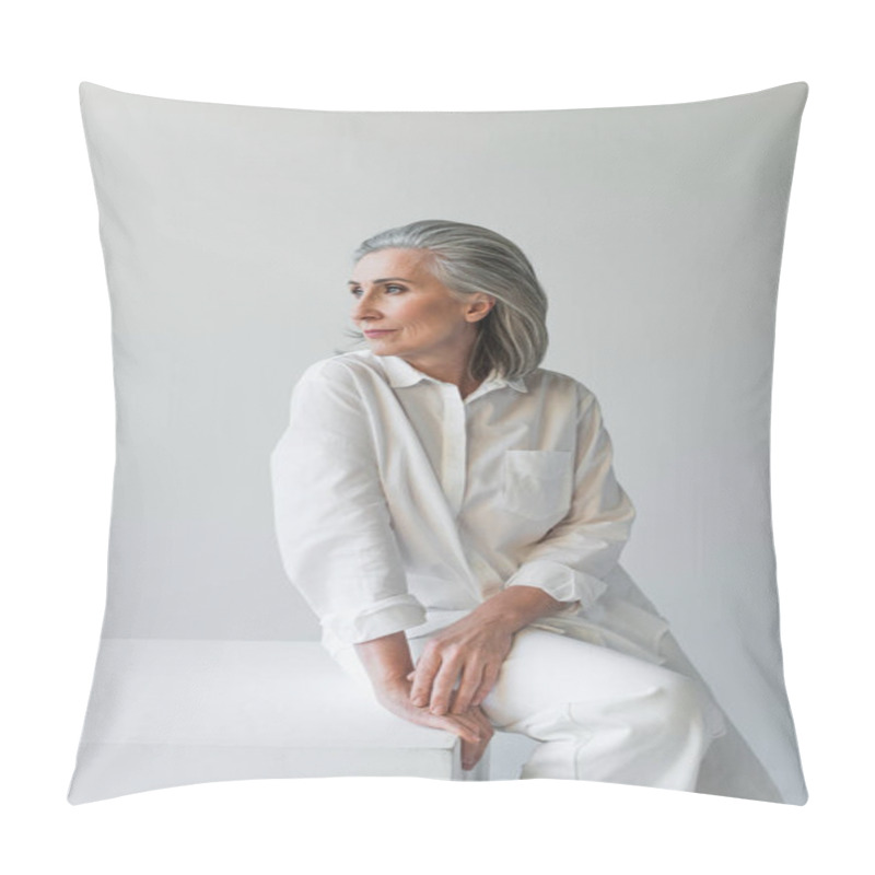 Personality  Mature Woman Sitting On White Cube Isolated On Grey  Pillow Covers