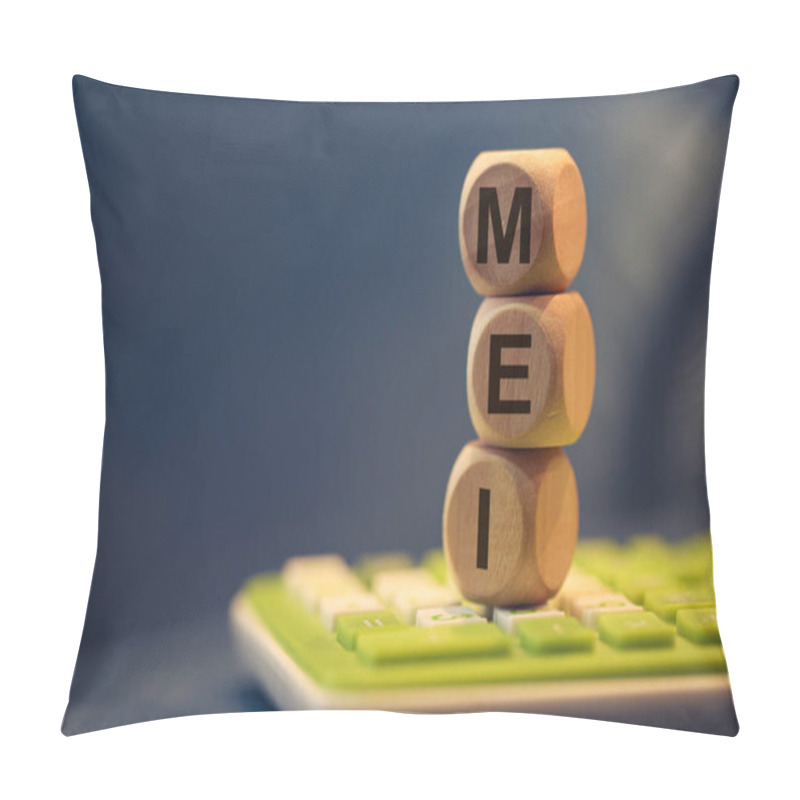 Personality  The Acronym MEI For Individual Microentrepreneur Written On Wooden Cubes. A Calculator In The Composition.  Pillow Covers