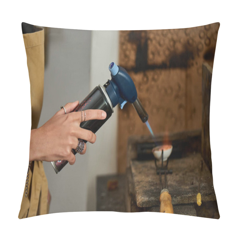 Personality  An Artisan Focuses Intently While Using A Torch To Shape Exquisite Jewelry In Her Studio. Pillow Covers