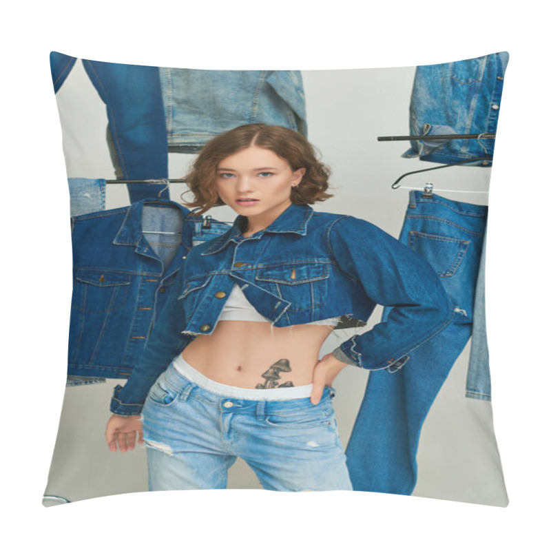 Personality  Pretty Girl In Cropped Jacket And Jeans Posing With Hand On Hip Among Trendy Denim Clothes On Grey Pillow Covers