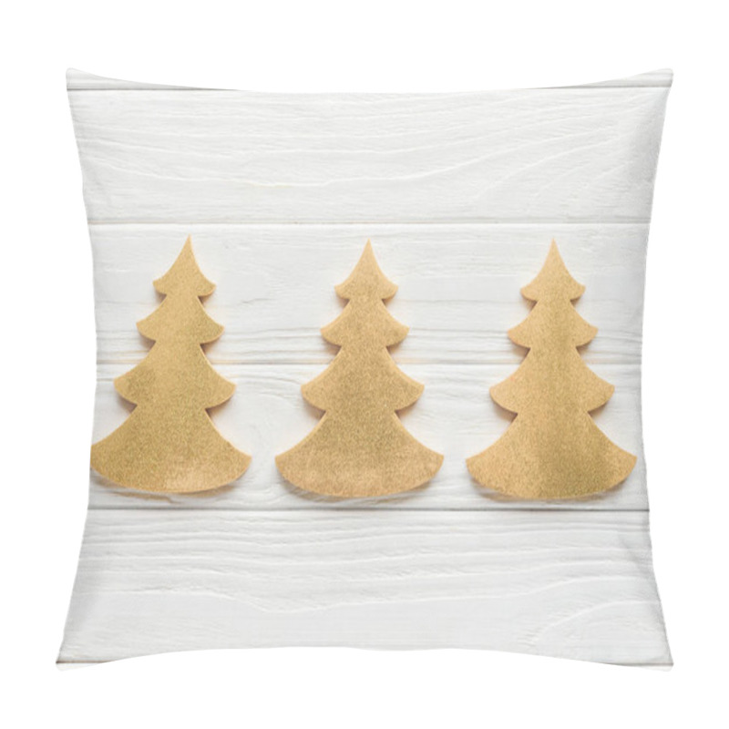 Personality  Top View Of Arranged Decorative Golden Pine Trees On White Wooden Surface Pillow Covers