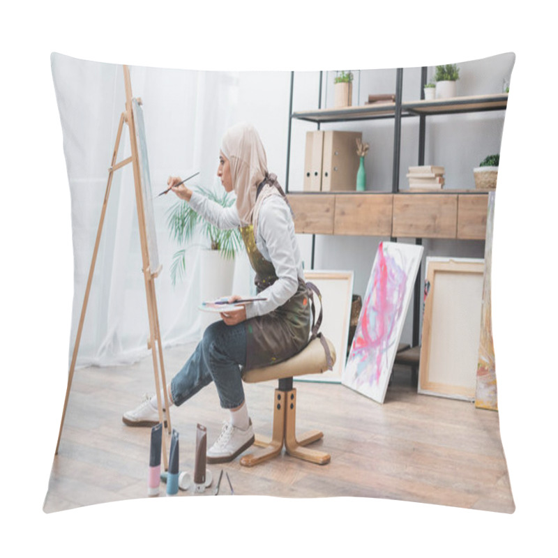 Personality  Side View Of Muslim Woman Sitting On Chair And Drawing On Easel At Home Pillow Covers