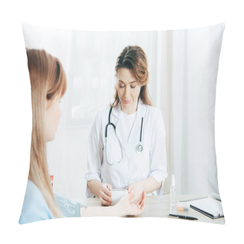 Personality  Cropped View Of Patient And Doctor Measuring Blood Pressure Pillow Covers