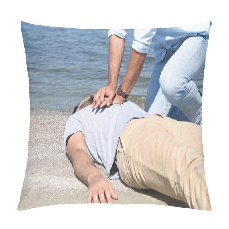 Personality  Passerby Performing CPR On Unconscious Young Man Near Sea. First Aid Pillow Covers