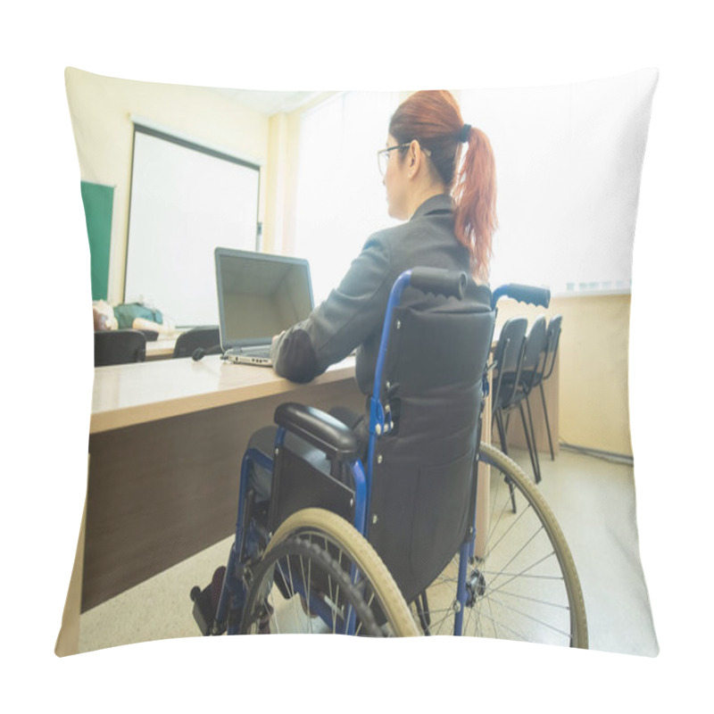 Personality  Young Woman Works At A Laptop While Sitting In A Wheelchair In A University Lecture Hall. Conditions For Teaching A Disabled Person Pillow Covers