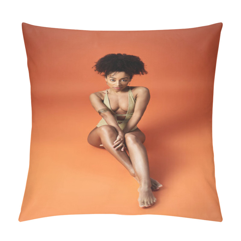 Personality  Stylish African American Woman In Trendy Swimsuit Seated On Vibrant Orange Backdrop. Pillow Covers