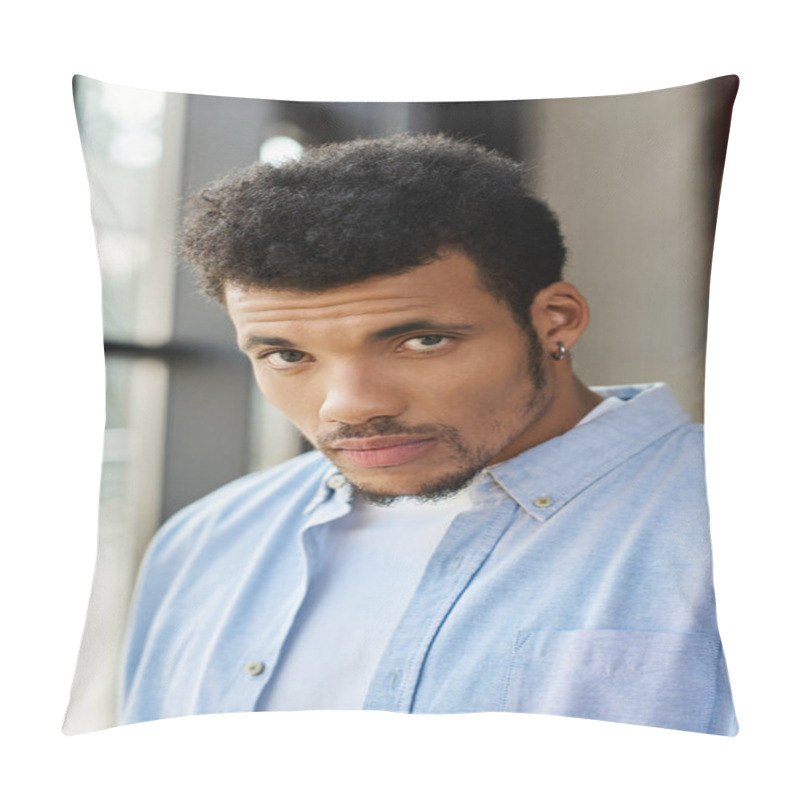 Personality  A Confident Young Man Stands By Bright Windows, Lost In Thought With An Intense Gaze. Pillow Covers