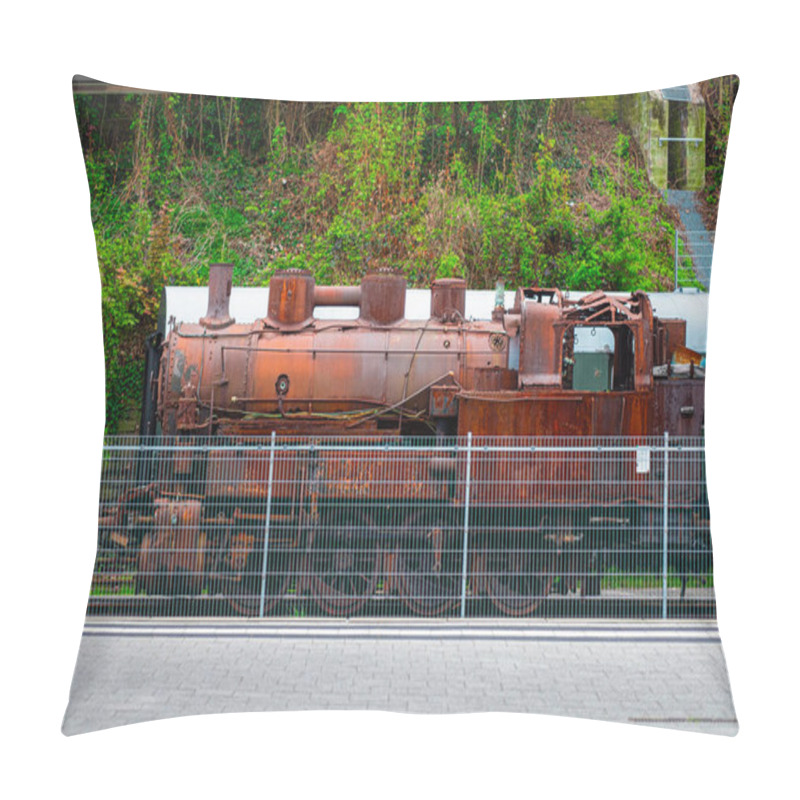 Personality  An Old Steam Locomotive, Covered In Rust, Stands Behind A Metal Fence Surrounded By Lush, Overgrown Vegetation. The Scene Evokes Nostalgia And The Heritage Of The Industrial Era. Pillow Covers