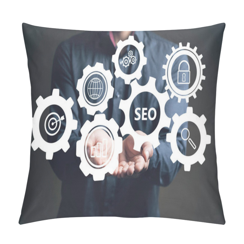 Personality  SEO In Gear. Man Holding In His Hand Pillow Covers