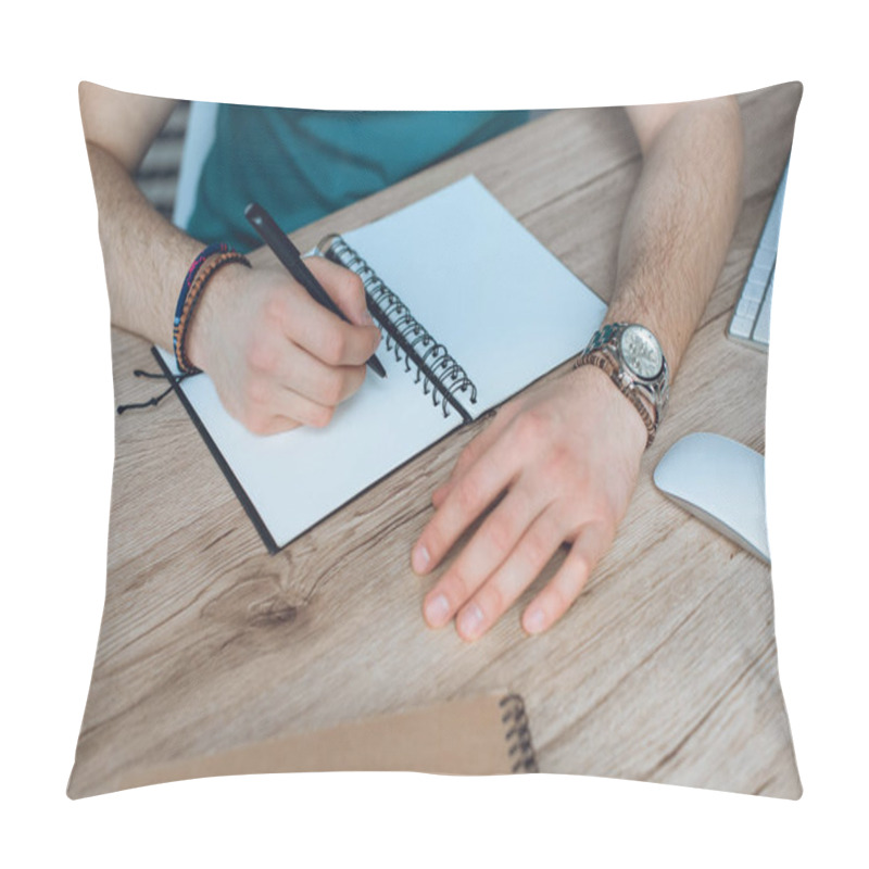 Personality  Cropped Shot Of Young Man Taking Notes In Blank Notebook Pillow Covers