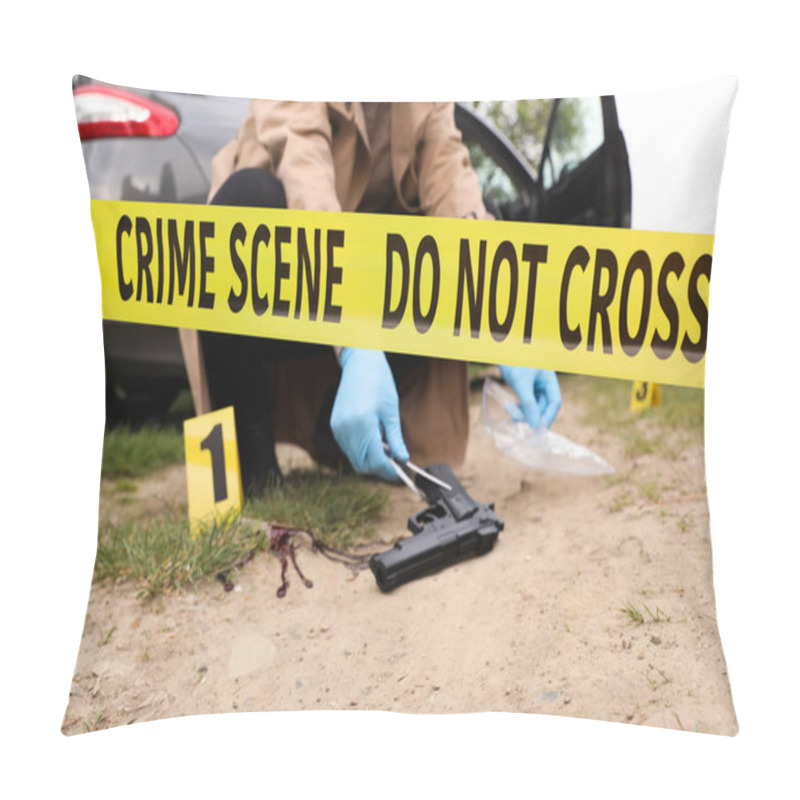 Personality  Investigator In Protective Gloves Working With Evidence At Crime Scene Outdoors, Focus On Yellow Tape Pillow Covers