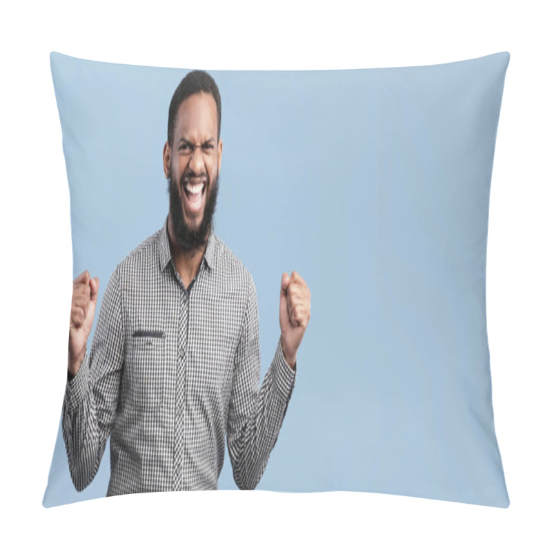 Personality  Success Concept. Excited African Man Making Winner Gesture With Clenched Fists Over Blue Studio Wall, Copyspace Pillow Covers