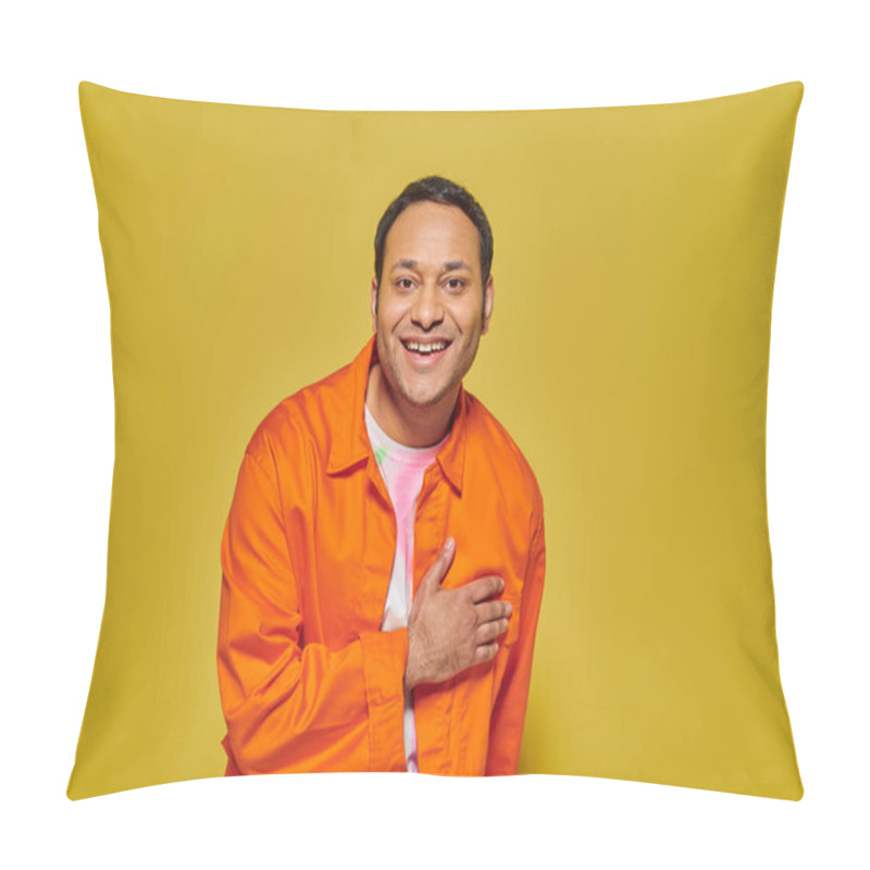 Personality  Portrait Of Joyful Indian Man In Orange Jacket Looking At Camera And Smiling On Yellow Backdrop Pillow Covers