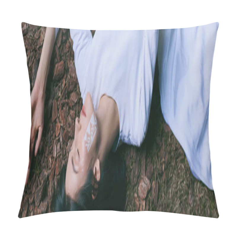 Personality  A Woman In A White Dress Lies On Ground, Her Face Serene. Pillow Covers