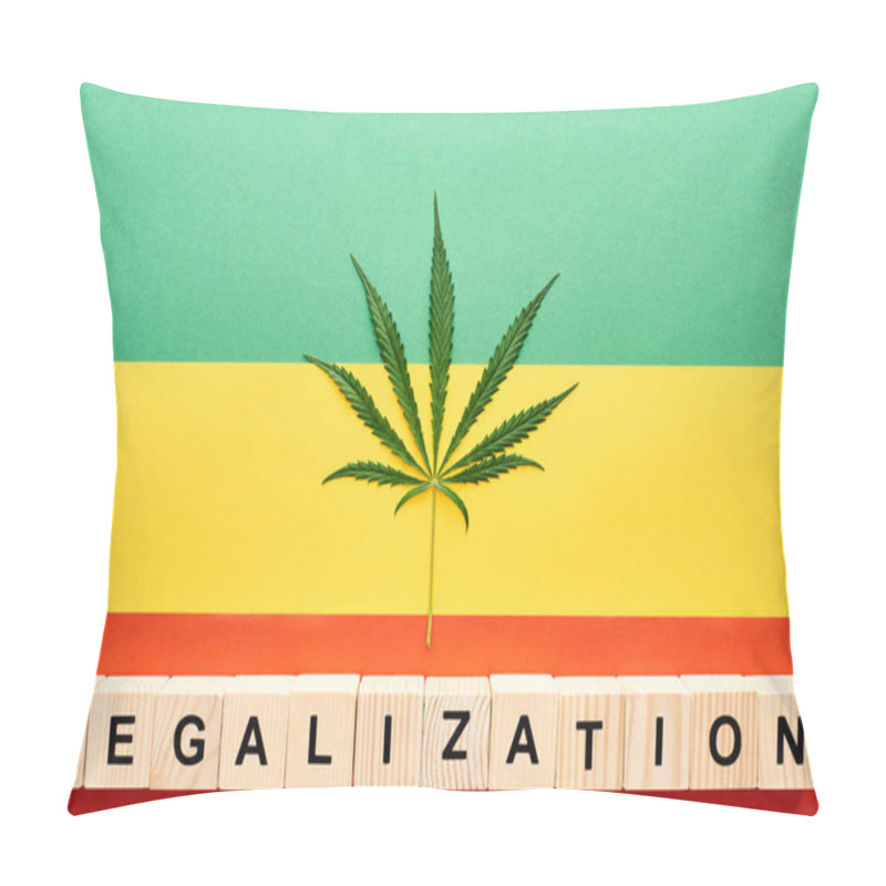 Personality  Top View Of Cannabis Leaf And Wooden Blocks With Legalization Lettering On Rastafarian Flag Background Pillow Covers