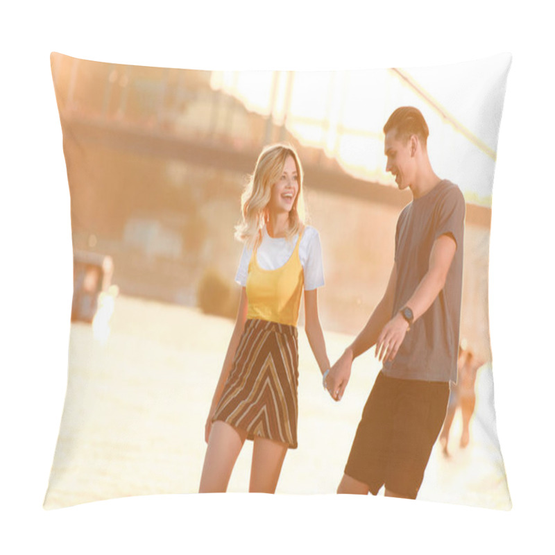 Personality  Smiling Young Couple Holding Hands And Having Fun On River Beach During Beautiful Sunset Pillow Covers