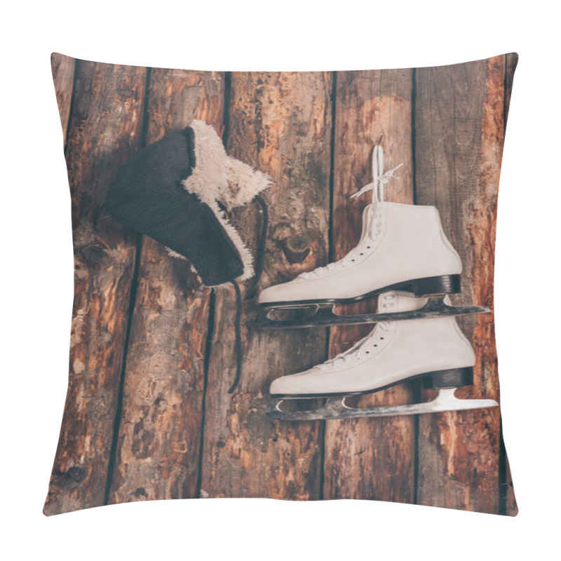 Personality  Hat With Ear Flaps And Pair Of Skates Hanging On Wooden Wall Pillow Covers