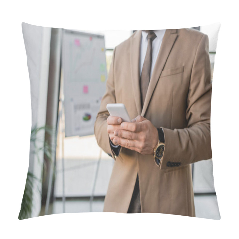 Personality  Partial View Of Elegant And Accomplished Businessman In Beige Blazer And Tie Using Mobile Phone Near Flip Chart With Strategy Planning And Graphs On Blurred Background Pillow Covers