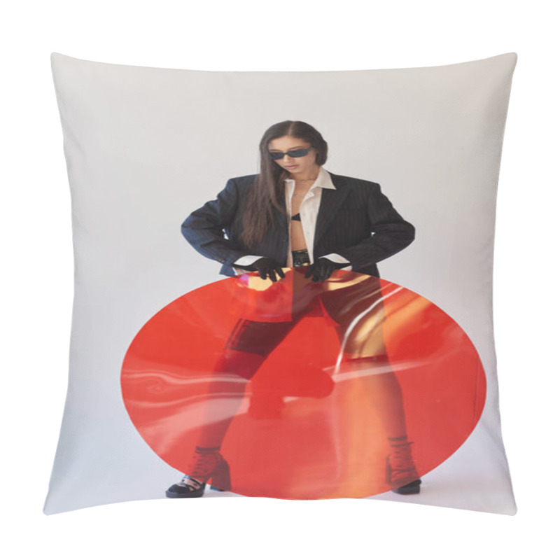 Personality  Attractive Asian Model In Stylish Look And Sunglasses Posing Holding Red Round Shaped Glass, Grey Background, Blazer And Latex Shorts, Youthful And Modern Woman, Fashion Forward, Studio Photography  Pillow Covers