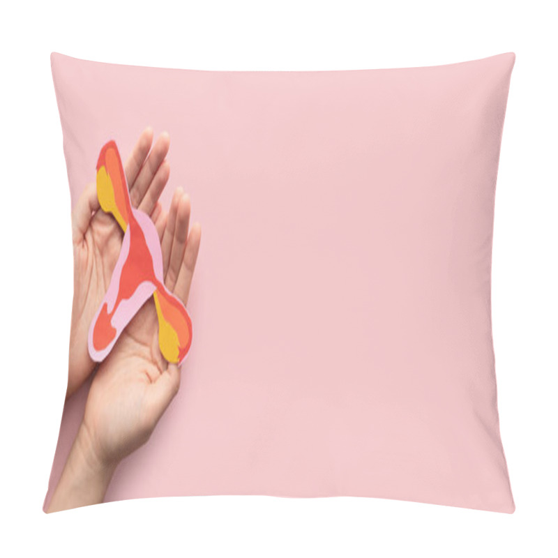 Personality  Female Reproductive Health Concept. Woman Hand Holding Uterus Shape Made Frome Paper On Pink Background. Awareness Of Uterus Illness Such As Endometriosis, PCOS, STDs Or Gynecologic Cancer. Pillow Covers