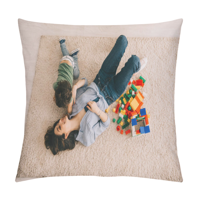 Personality  Overhead View Of Smiling Mom And Son Lying On Carpet With Toy Blocks Pillow Covers