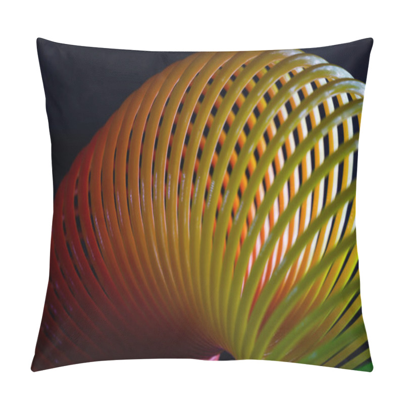 Personality  A Closeup Shot Of A Slinky Rainbow Spring Toy On A Black Background Pillow Covers