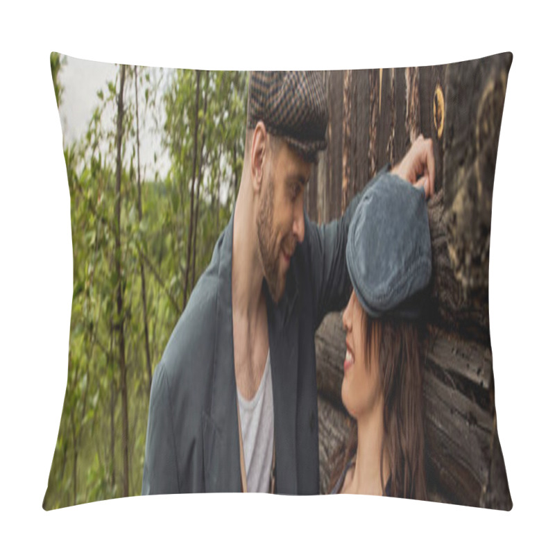 Personality  Smiling And Fashionable Man In Jacket And Newsboy Cap Looking At Cheerful Girlfriend While Standing Together Near Rustic House At Nature, Stylish Couple In Rural Setting, Banner  Pillow Covers