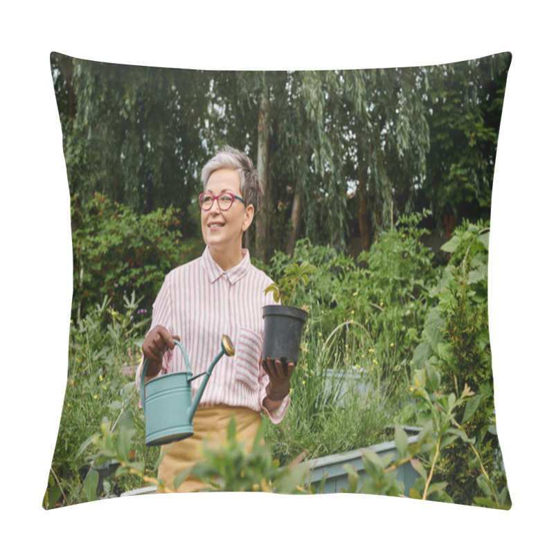 Personality  Beautiful Cheerful Mature Woman Holding Watering Can And Pot With Plant In Her Garden In England Pillow Covers