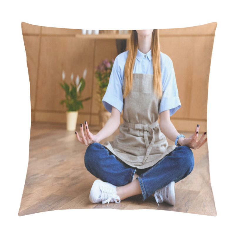 Personality  Cropped Shot Of Smiling Young Florist In Apron Sitting In Lotus Position On Floor  Pillow Covers