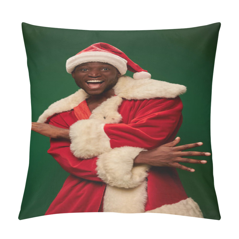 Personality  Overjoyed African American Man In Santa Claus Costume Gesturing And Looking At Camera On Green Pillow Covers