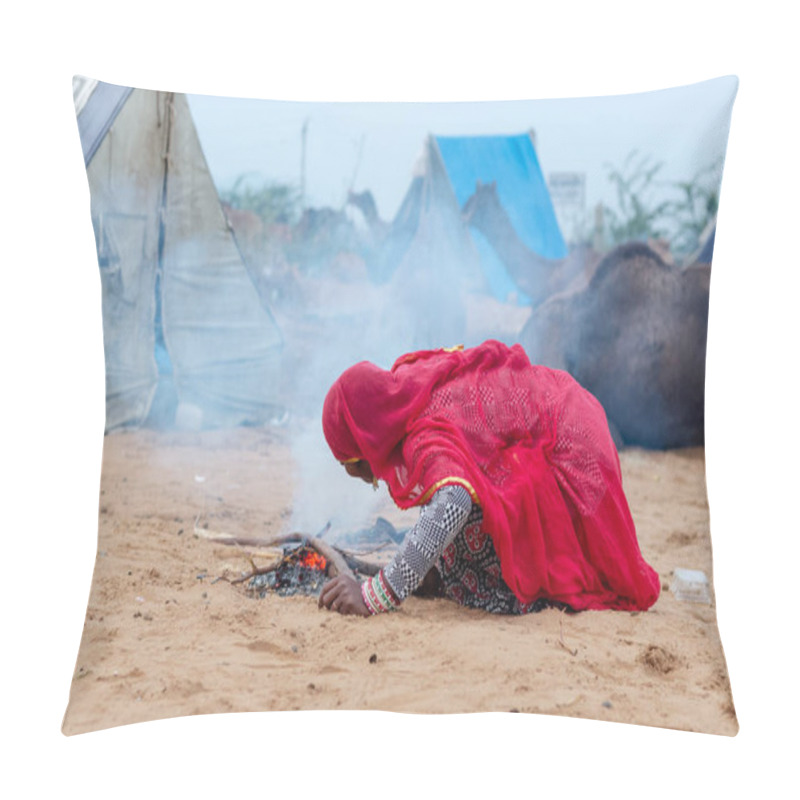 Personality  PUSHKAR, RAJASTHAN / INDIA - NOVEMBER 2019 : Portrait Of Indian Woman In Ethnic Colorful Rajasthani Dress Blowing Fire To Get Warm In Pushkar Camel Fair Ground Pillow Covers