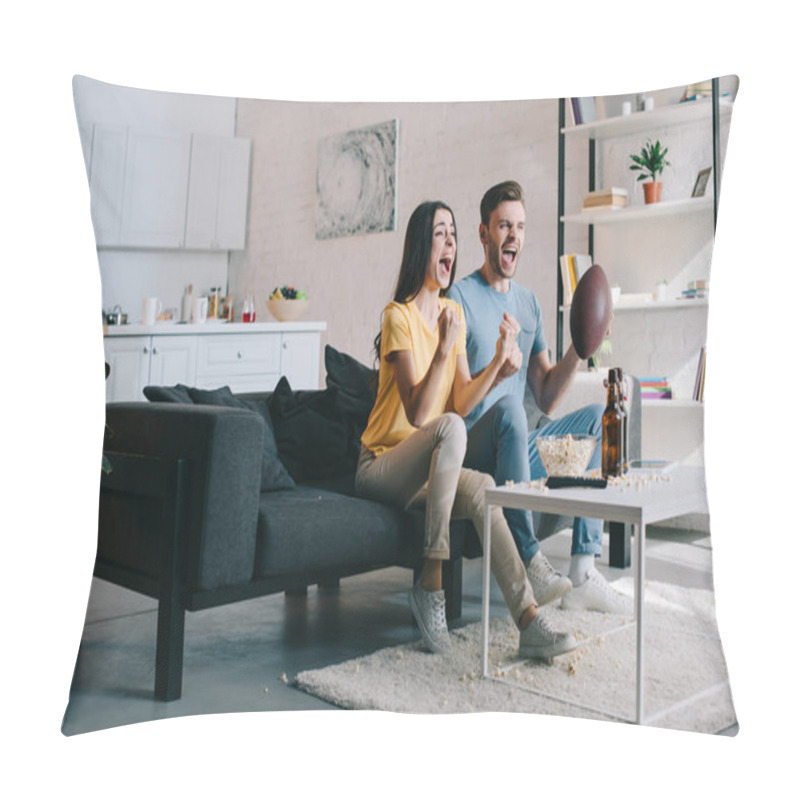 Personality  Expressive Young Couple Cheering For American Football Game At Home Pillow Covers