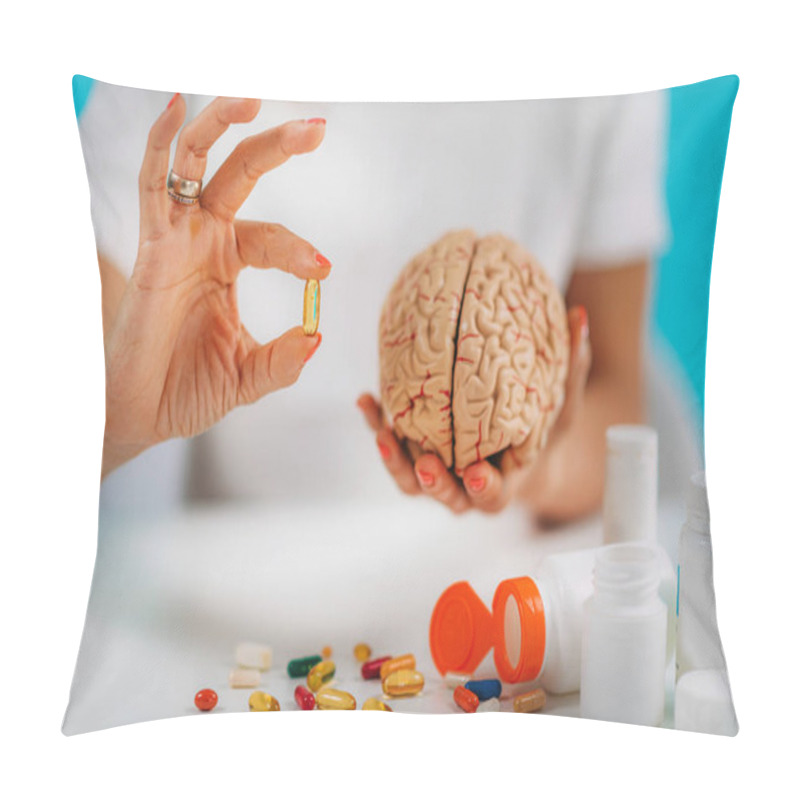 Personality  Cognitive Improvement Or Brain Supplements. Woman Holding A Supplement Capsule And A Model Brain. Pillow Covers