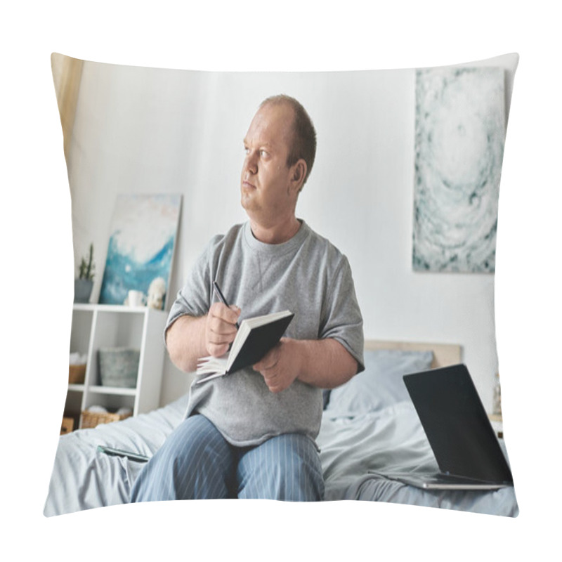 Personality  A Man With Inclusivity Sits On A Bed, Pen In Hand, Notebook Open, Lost In Thought. Pillow Covers