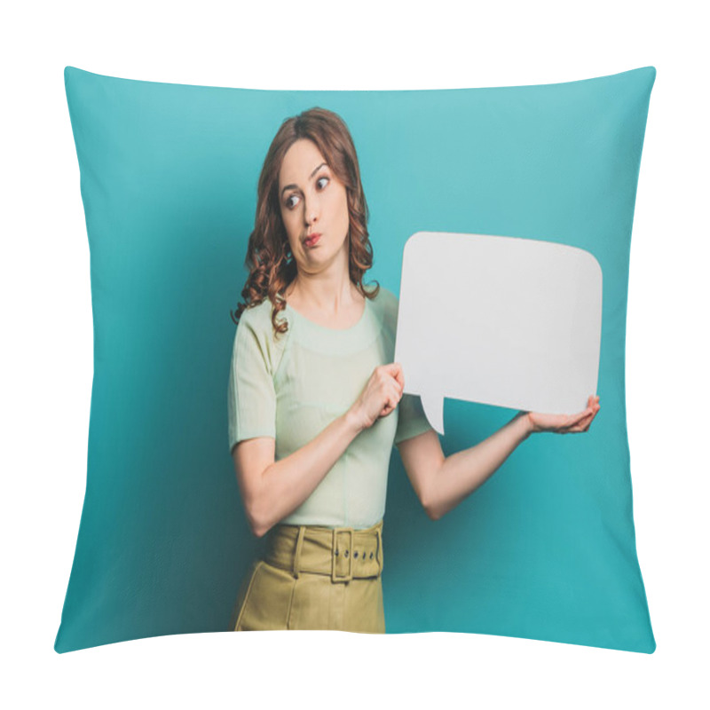 Personality  Skeptical Girl Grimacing While Holding Speech Bubble On Blue Background Pillow Covers