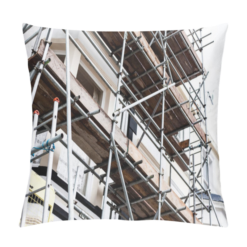 Personality  Construction And Repair Building On The Street With Metal Protection. Restoring And Repairing Building Facade. Building Under Repair And Construction. Pillow Covers