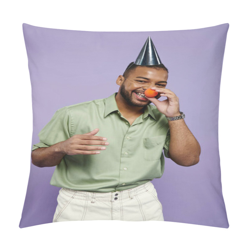 Personality  Young Man With Braces Dons A Party Hat And Holds A Vibrant Orange Against A Purple Backdrop. Pillow Covers