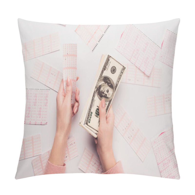 Personality  Cropped View Of Woman Holding Dollar Banknotes And Lottery Ticket Near Scattered Lottery Cards On White Table Pillow Covers