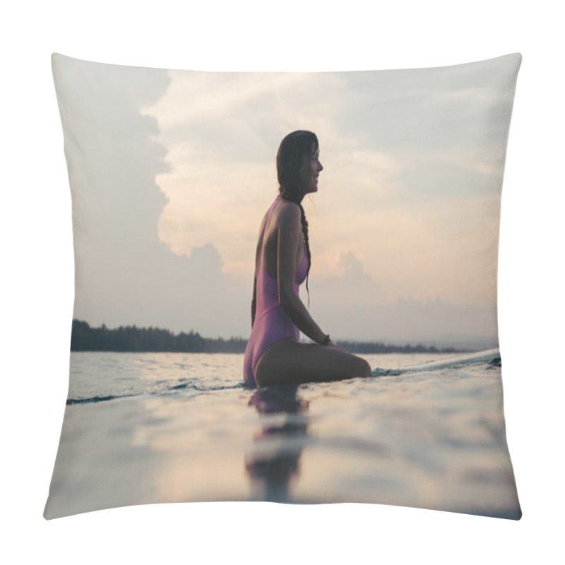 Personality  Happy Female Surfer Sitting On Surfboard In Water At Sunset Pillow Covers