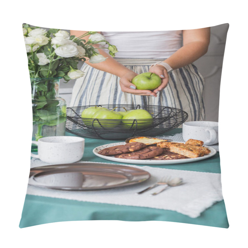 Personality  Woman With Green Apple In Her Hands Standing Next To Kitchen Table With Cookies On Plate And Coffee Mugs Pillow Covers