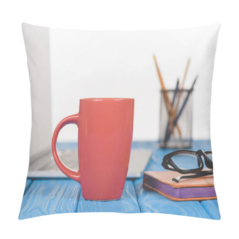 Personality  Closeup Shot Of Red Cup, Eyeglasses On Textbook, Laptop And Organizer With Pens And Pencils  Pillow Covers