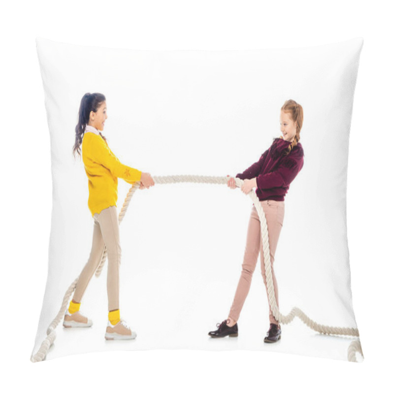 Personality  Two Cheerful Schoolgirls Pulling Rope And Looking At Each Other Isolated On White Pillow Covers