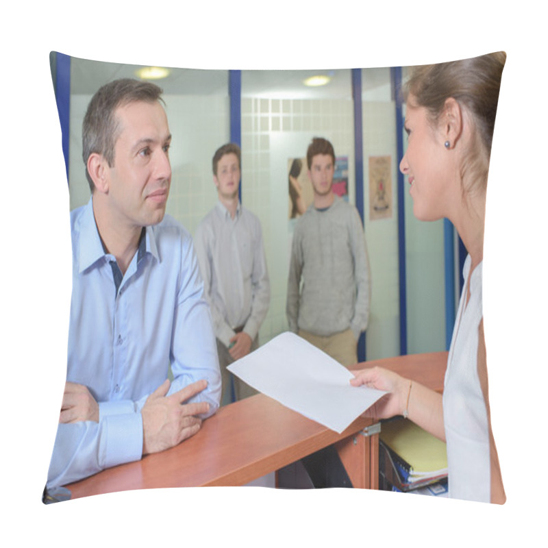 Personality  Lady Handing Form To Man At Reception Desk Pillow Covers