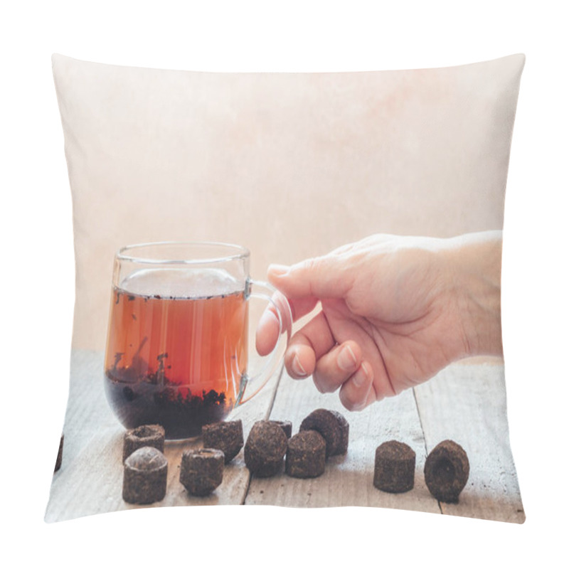 Personality  A Hand Holding A Cup Of Traditional Chinese Puer Tea With Aged Puerh Tea Bricks On Wooden Background, Brewing Of Pu-erh Sachets Pillow Covers