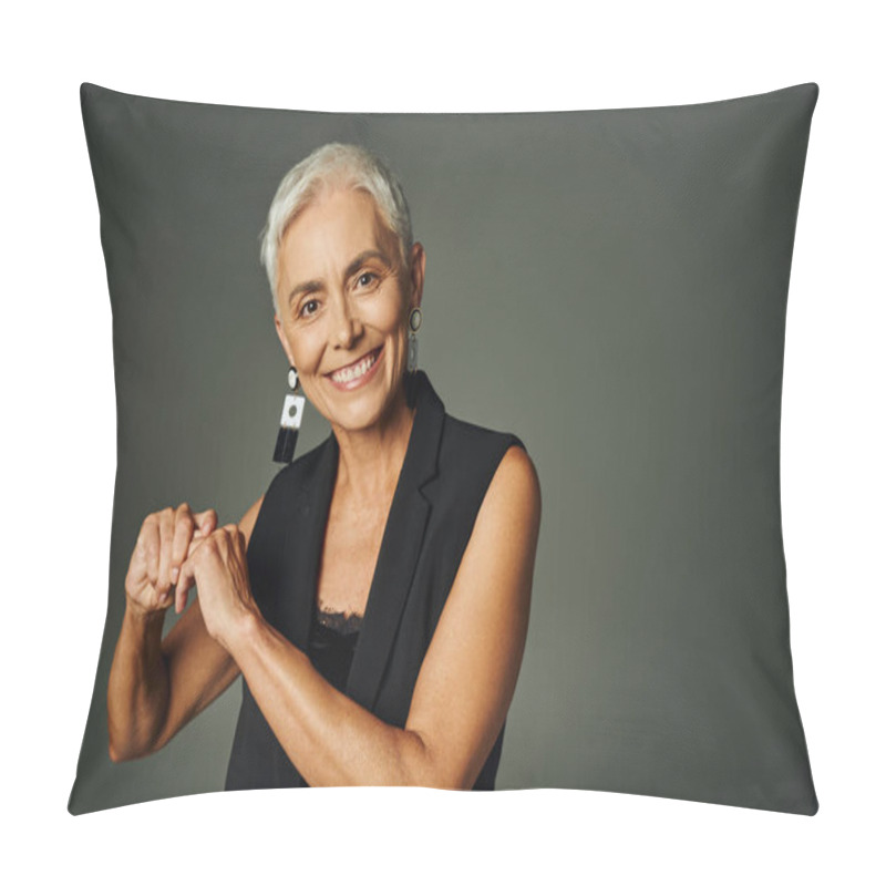 Personality  Happy Mature Lady In Stylish Earrings And Black Attire Smiling At Camera On Grey, Elegance And Charm Pillow Covers