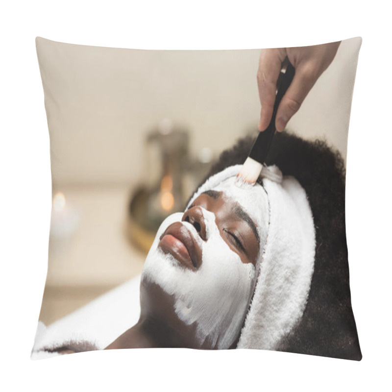 Personality  African American Woman In Headband Lying Near Spa Therapist Applying Face Mask On Forehead On Blurred Background  Pillow Covers