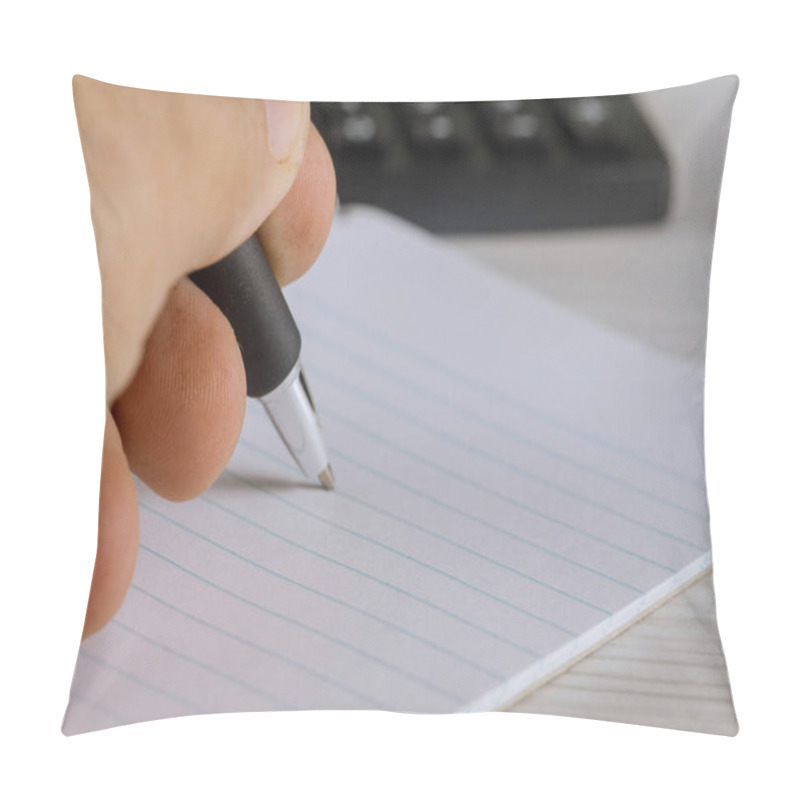 Personality  Hand Grips A Pen Over Blank Lined Paper, Ready To Write Calculator Is Visible In Background, Suggesting Focus On Tasks Productivity. Pillow Covers