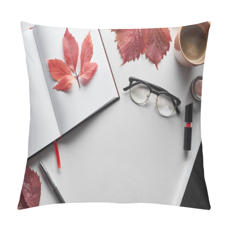 Personality  Top View Of Notebook Near Glasses, Coffee Cup, Cosmetics, Pen And Red Leaves Of Wild Grapes On White Table Pillow Covers