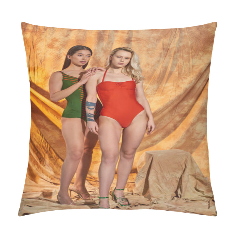 Personality  Full Length Of Multiethnic Models In Swimwear Posing Together On Beige Backdrop With Drapery Pillow Covers